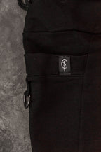 TRAPE Frayed with asymmetrical straps leggings [Black]