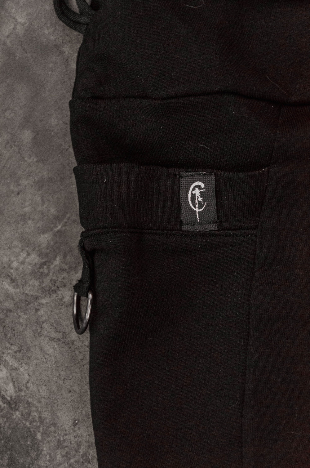 TRAPE Frayed with asymmetrical straps leggings [Black]