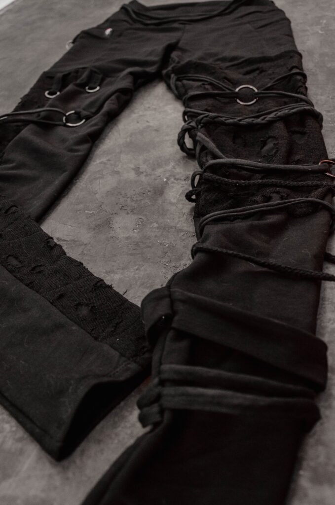 TRAPE gothic and cyberpunk distressed techwear leggings made by YNHOIA